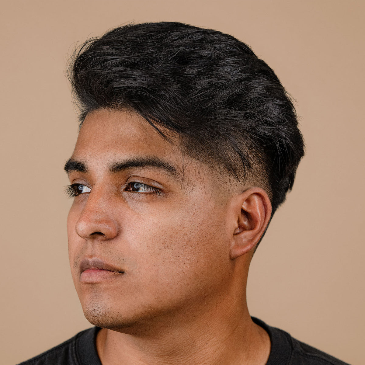 Man with hair styled with Suavecito Texturizing Powder