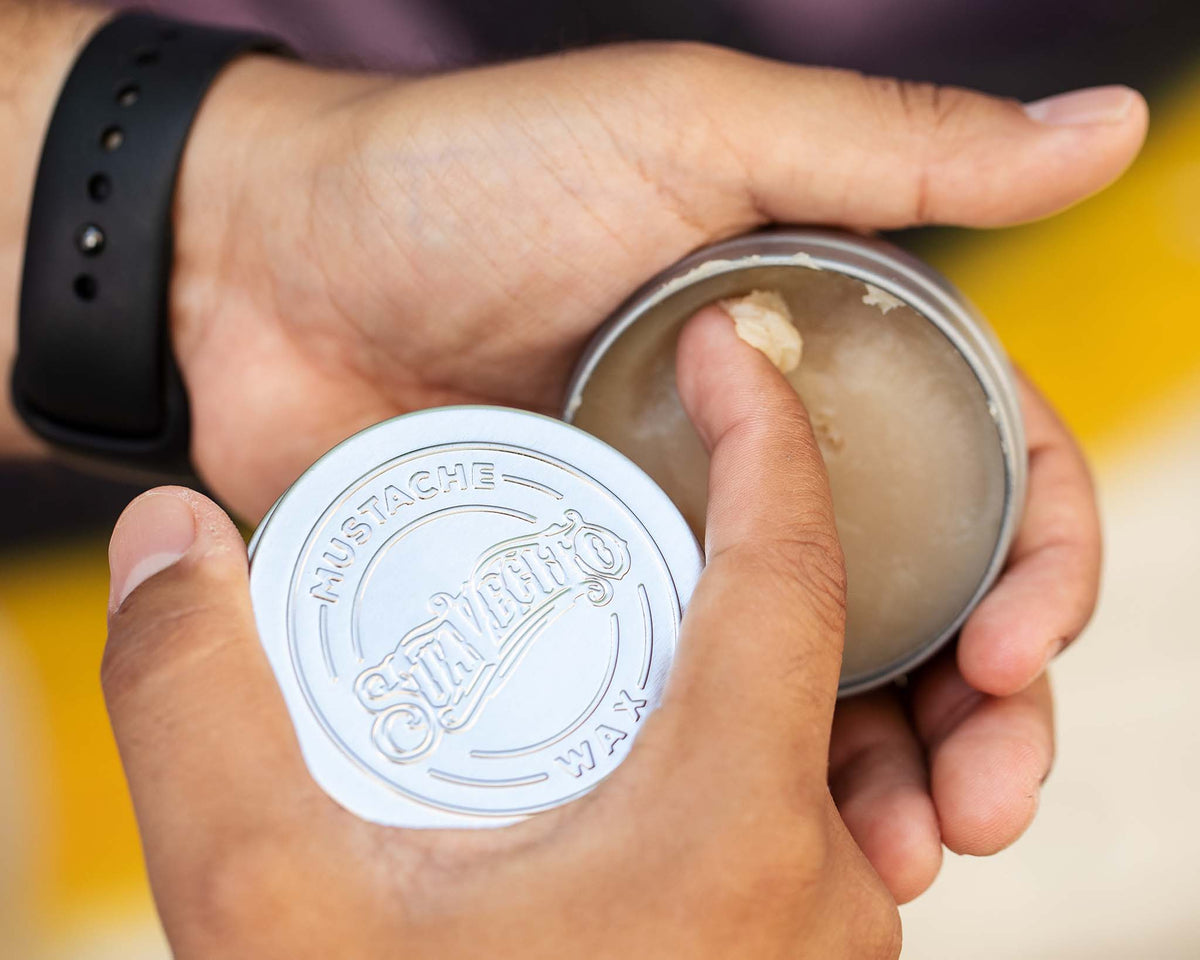 Suavecito Mustache Wax - Whiskey Bar being scooped out of tin