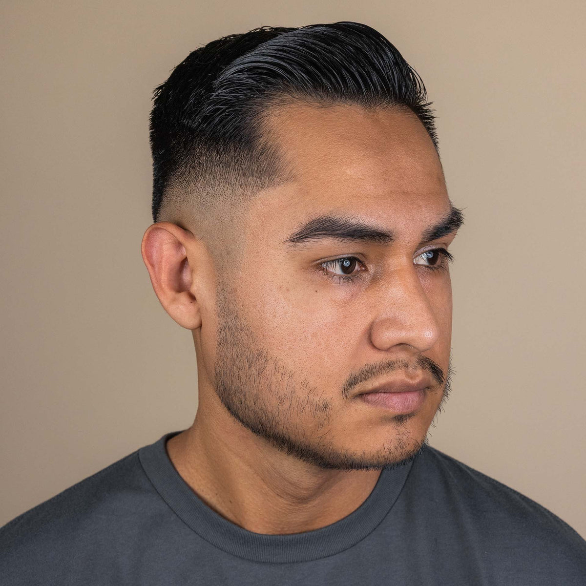 Man with hair styled with Suavecito Firme Hold Styling Gel