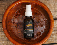 Bay Rum Beard Oil - in bowl of oil 