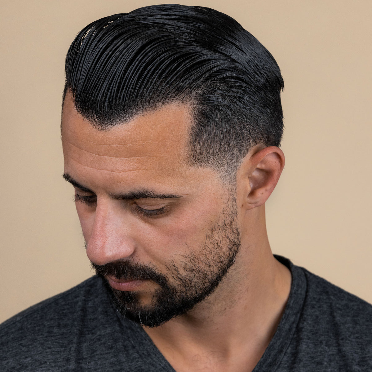 Man with hair styled with Suavecito water based pomade