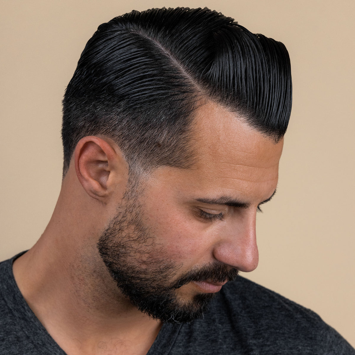Man with hair styled with Suavecito water based pomade