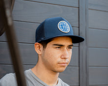 Load image into Gallery viewer, man wearing - blue suavecito hat with white embroidered text and blue background &quot;cito&quot; in round shape
