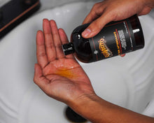 Bay Rum Aftershave 16 oz being applied to hand