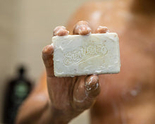 Suavecito Body Soap Whiskey Bar being held