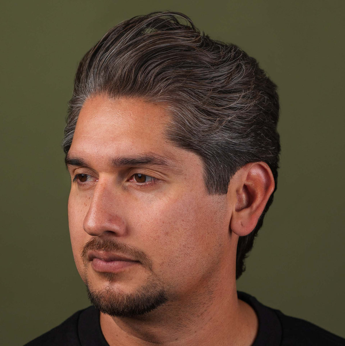 Man with hair styled with Premium Blends Matte Pomade