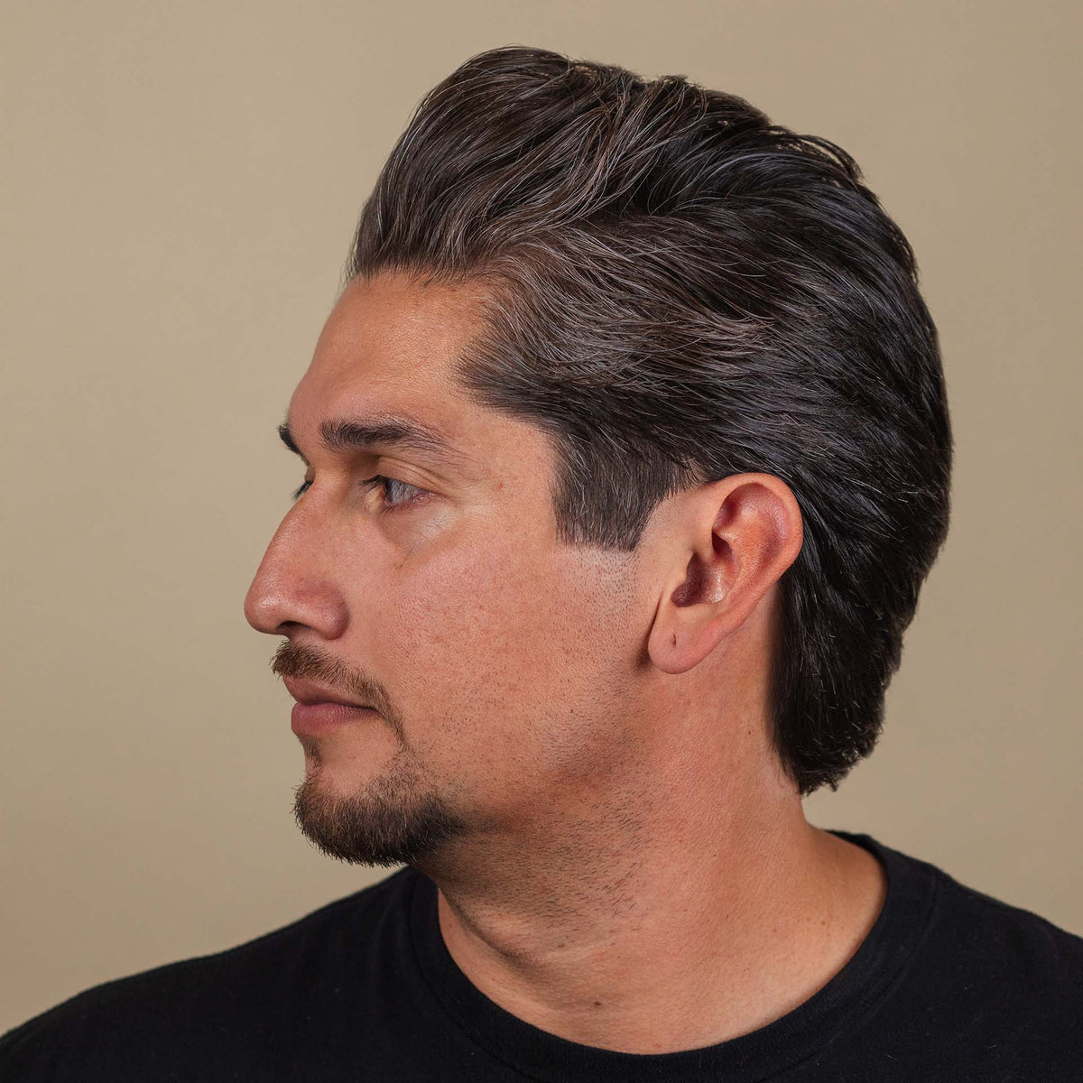 Man with hair styled with Suavecito Hairspray