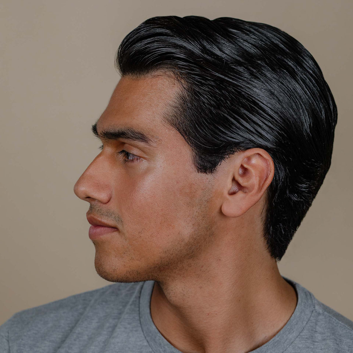Man with hair styled with Suavecito Firme Hold Styling Gel
