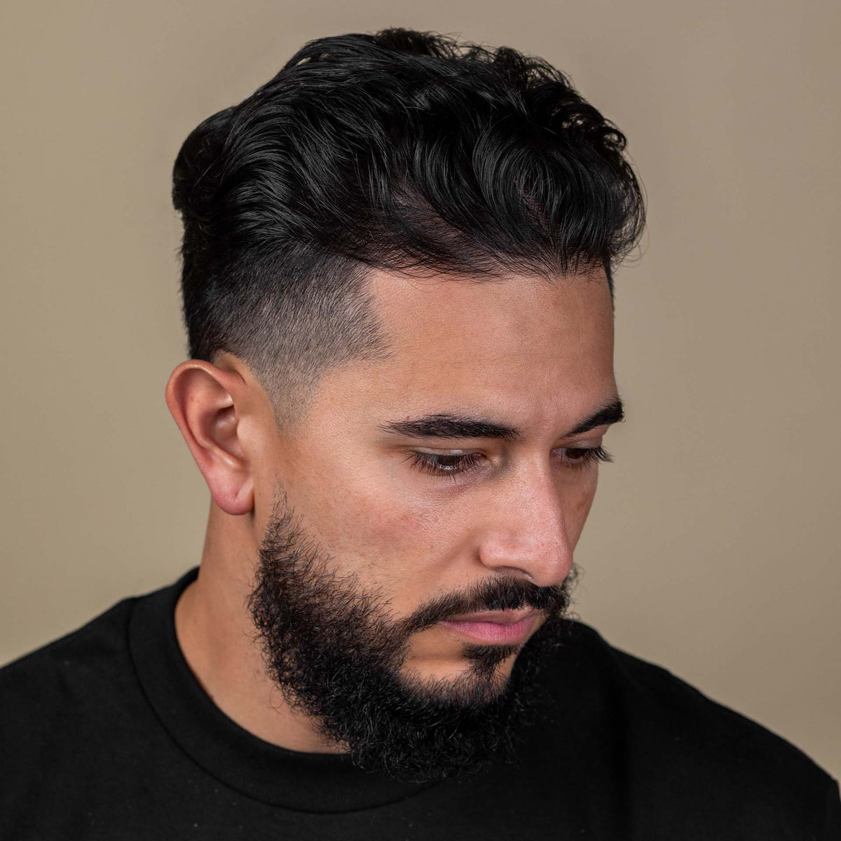 Man with hair styled with Suavecito Hair Cream