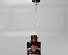 whiskey bar 1 fl oz beard oil with pump lifted  