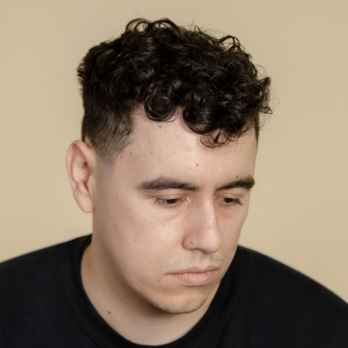 man with hair styled with Suavecito Sea Salt Spray