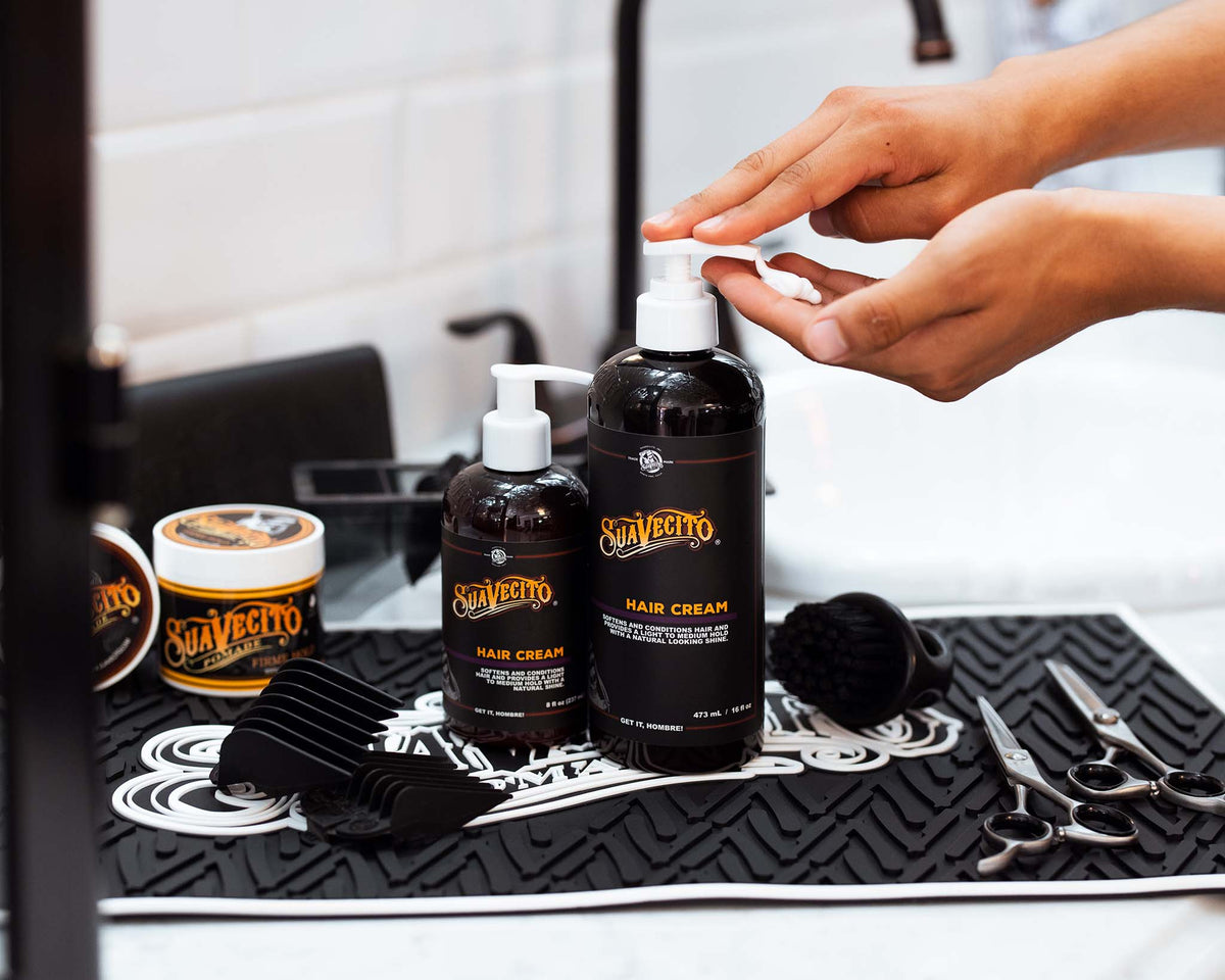 Suavecito Hair Cream being pumped into hand