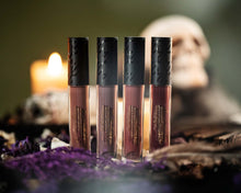 Bruja Lipgrip and other spellbound collection lipgrips lined up