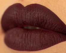 extreme closeup of Bruja Lipgrip on lips