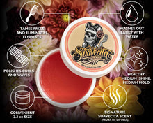 Suavecita pomade container with features listed on a floral background