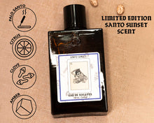 Suavecito limited edition Santo Sunset cologne bottle 100ml set against a textured background with graphics showing scent notes: palo santo wood, citrus, clove, and amber”