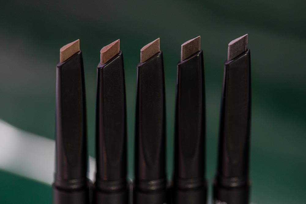 Eyebrow Pomade pencils opened and lined up