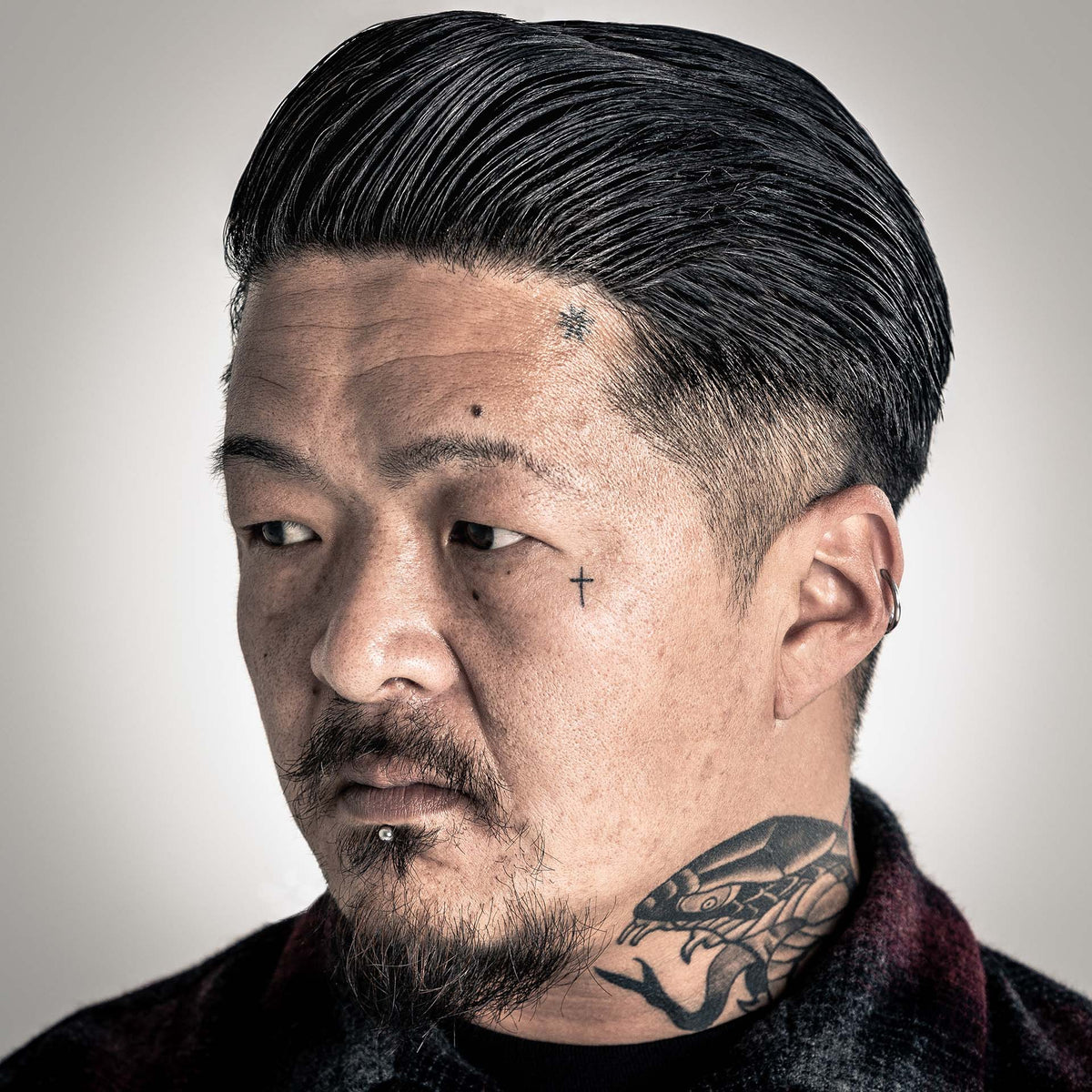 man with hair styled with Suavecito Oil Based Pomade