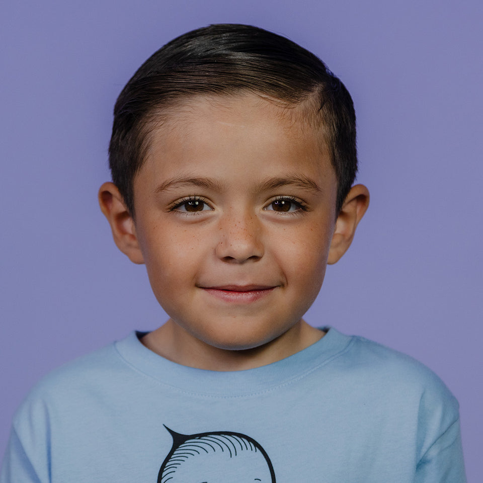 kid with hair styled with pomade