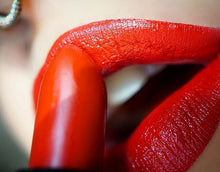 closeup of Strut Semi-Matte Lipstick being applied to lips by @thedameoclock