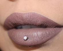 closeup of dauntless lipgrip on lips with piercing by @thelipstickcoven