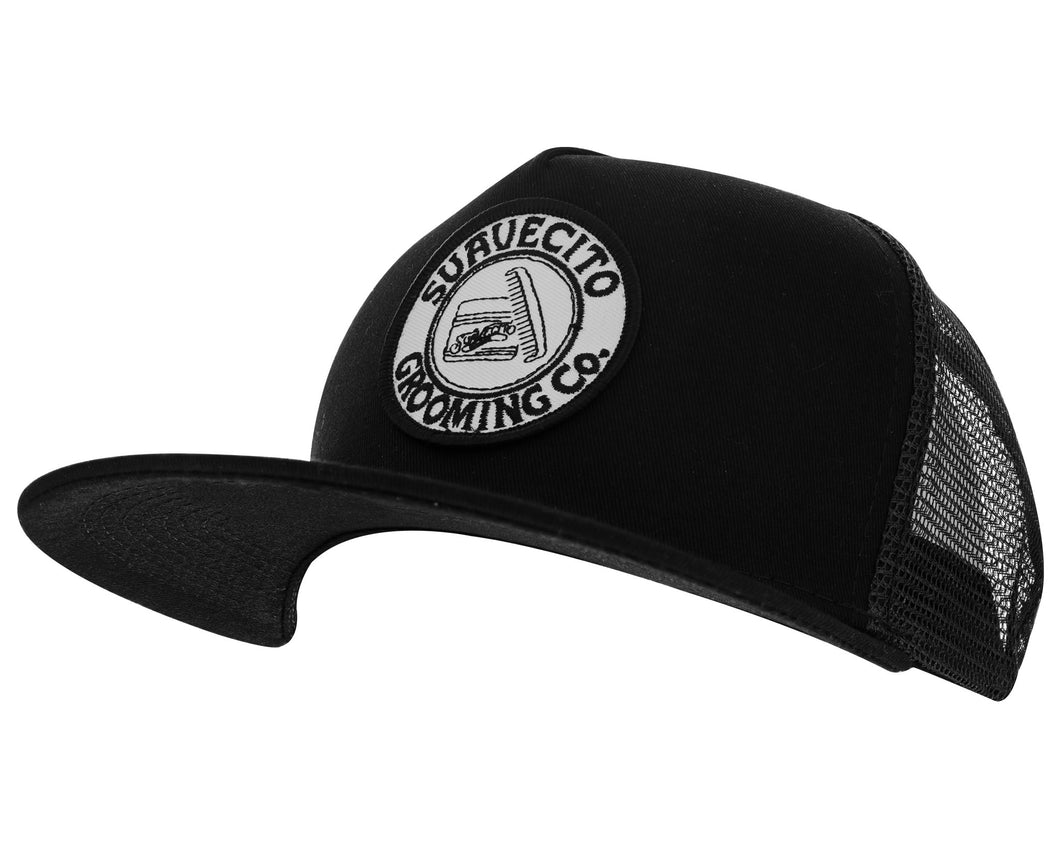 black suavecito hat with black embroidered text and white background 