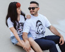 Load image into Gallery viewer, Models wearing the Men&#39;s and Women&#39;s Suavecito and Suavecita X Amber Tilden Tees
